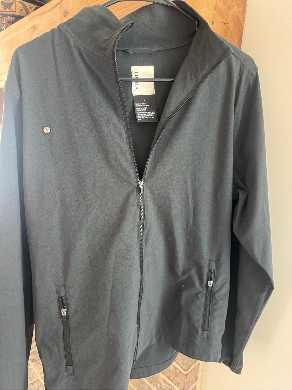 Vuori Venture Track Jacket, a midweight, water-resistant full-zip jacket featuri